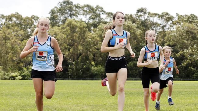 Pictured in Rouse Hill are Little Athletic kids (L-R) Flynn Cowper 12, Lily Caines 12, Ella Caines 10 and Zane Cowper 9, who aren't able to return to the sporting field until December. Picture: Tim Hunter.