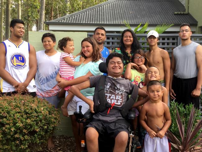 Payne Haas (far left) with his family. His brother Chase is pictured at the front.