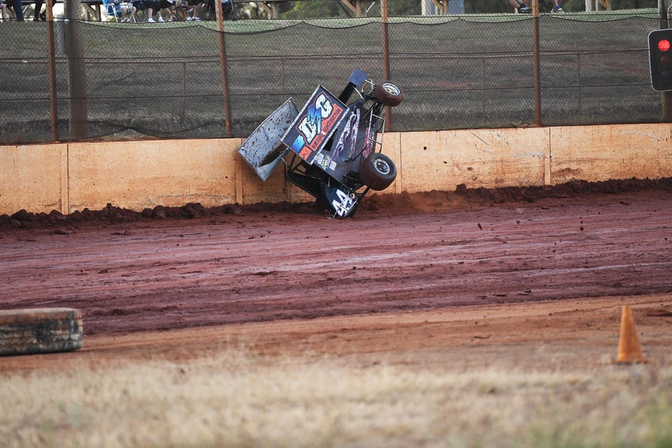 Maryborough Speedway Round One - Ken Newton climbs the wall after losing control on the slippery track. Picture: Cody Fox