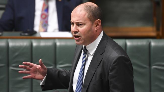 Treasurer Josh Frydenberg says keeping the borders closed is costing jobs. Picture: AAP Image/Lukas Coch