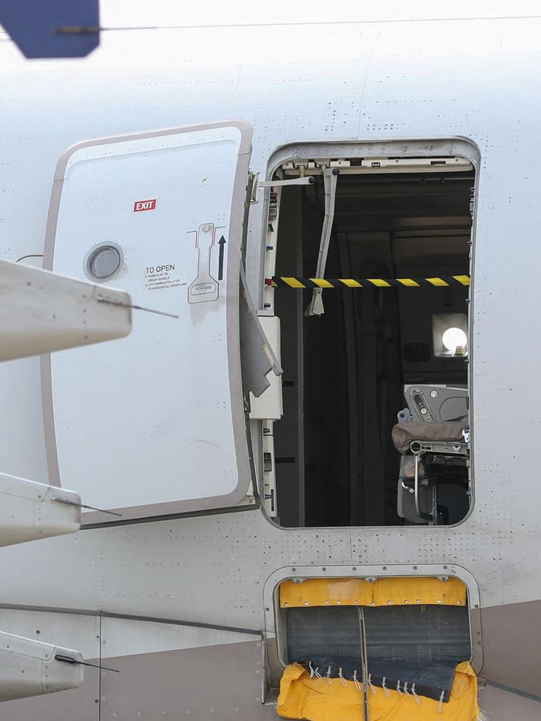 The door was manually opened by a passenger about 200m above the ground. Picture: Yonhap/AFP