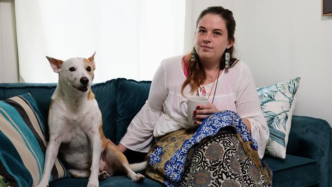 Now living in a long-term share house managed by the Salvation Army in Mooroobool — with her cat, bird, and dog Nahla. Picture: Brendan Radke