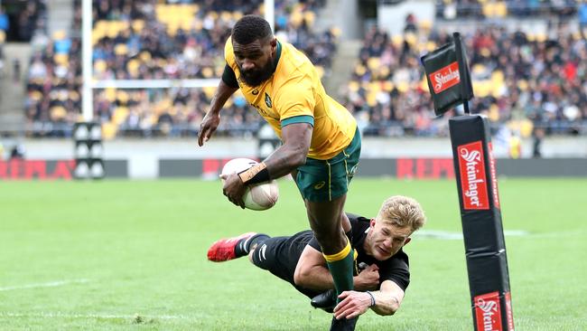 Marika Koroibete of the Wallabies dives over to score a try. Picture: Getty