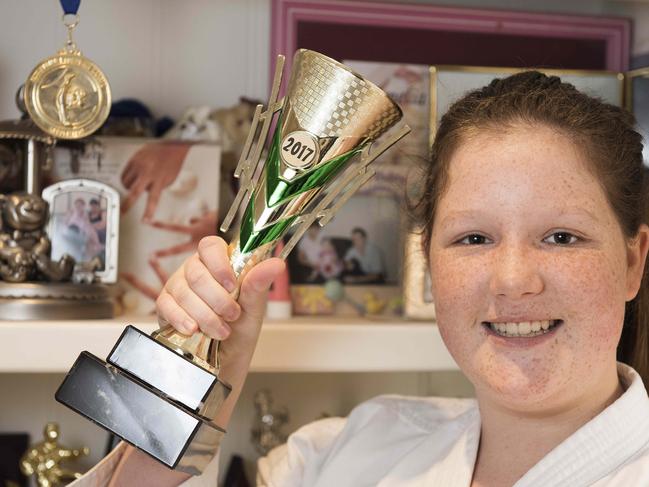 Amelia Cain, 13, is the Australian Under-14 national champion in Kyokushin (full contact) karate and is heading to Japan this month to compete in a prestigious world championship tournament. Picture: Ellen Smith