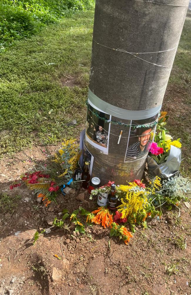 Flowers and tributes left at the site of a single-vehicle crash at Rochedale which resulted in the death of Charles 'CJ' Bishop on July 3.