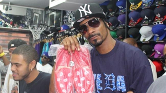 American rapper Snoop Dogg at Culture Kings in Southport in 2011. Store owner Simon Beard sold $25 000 worth of merchandise to Snoop and his entourage. Picture: Supplied.