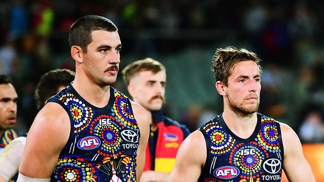 Taylor Walker and Richard Douglas reflect after the loss. Picture: Mark Brake/Getty Images