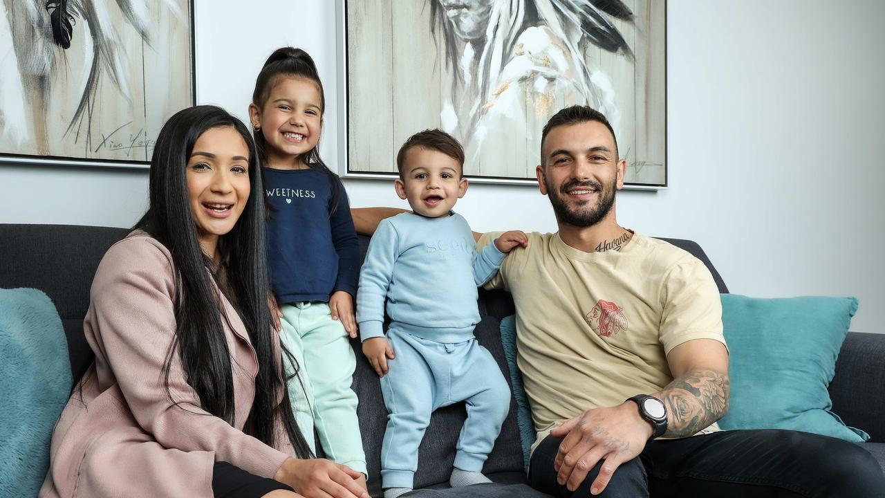 Amy McPherson with her partner Dean Martinov and their children Havana, 3, and Rome, 19 months. Picture: Ian Currie