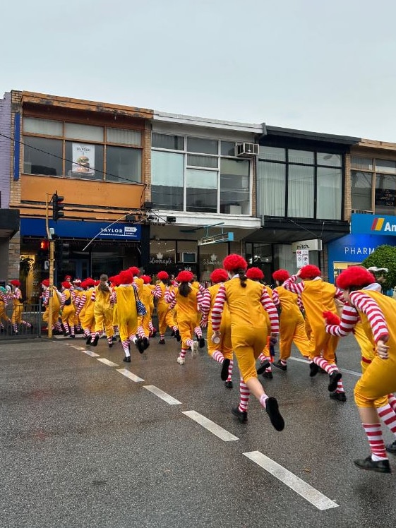 More than 100 Catholic schoolgirls stormed a local Macca’s in a muck-up prank that has gone viral. Picture: TikTok/@sacbalz