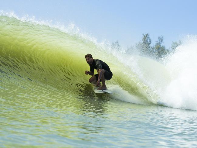 Thor himself, Chris Hemsworth riding one a wave at Kelly Slater’s Surf Ranch in California.