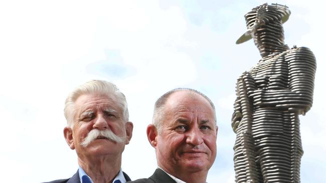 Chris Keating, former Burleigh Heads RSL sub-branch president with new president Craig McKenzie at the Burleigh memorial. Photo: Glenn Hampson