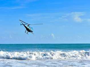 Before landing at the Orchid Beach helipad, fishing guests would circle over the water to study the beach gutters to find schools of fish to target. Picture: Contributed