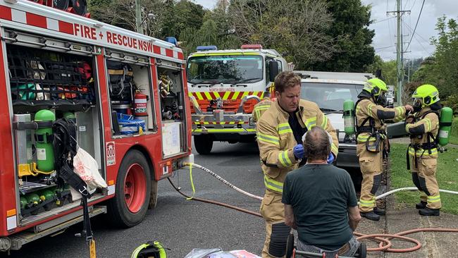 A man being treated for burns to the face on Lyon Street, Bellingen, on Thursday, October 6.