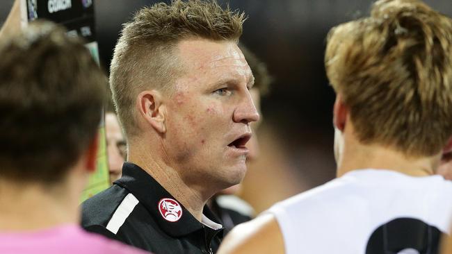 Nathan Buckley speaks to his players at the Gabba in Round 8. Pic: Peter Wallis