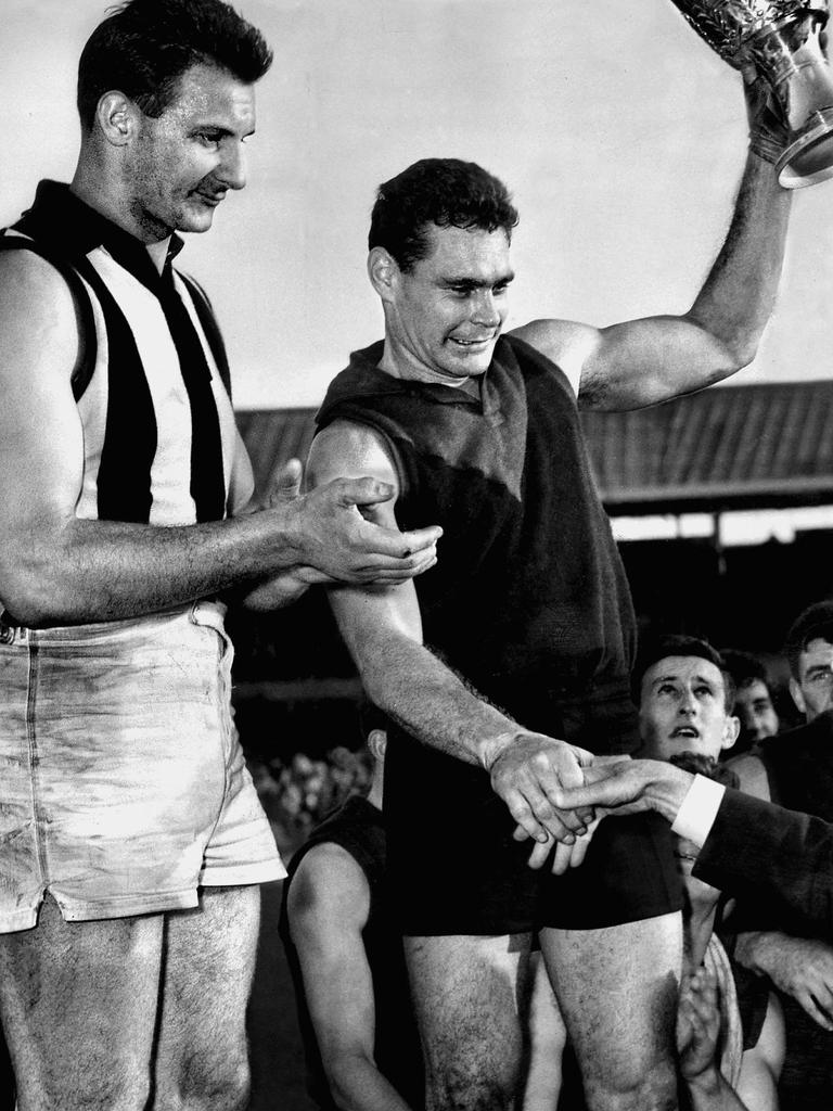 Barassi and Ray Gabelich with the 1964 premiership cup.