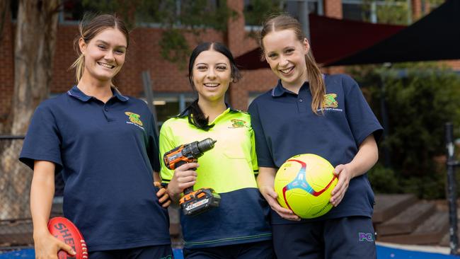 L-R Scarlett, 16,  Charlotte, 16 and Orlu, 16 Parade College in Preston as an all-boys school bur has now opened up its campus to female students as part of a new VET program. Picture: Jason Edwards