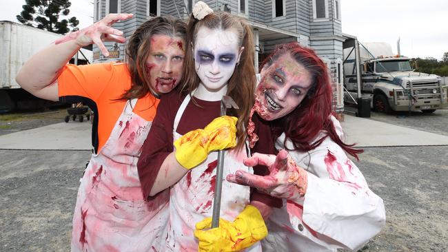 London Little (front), Charlotte Boyd (left) and Lauren Little warm up for Fearaphobia, which takes over the former NightQuarter site next to Westfield Helensvale every night from October 20-31.