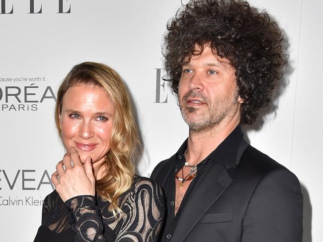 In love ... Renée Zellweger (L) and recording artist Doyle Bramhall II arrives at ELLE's 21st Annual Women In Hollywood at Four Seasons Hotel Los Angeles. Picture: Frazer Harrison/Getty Images.