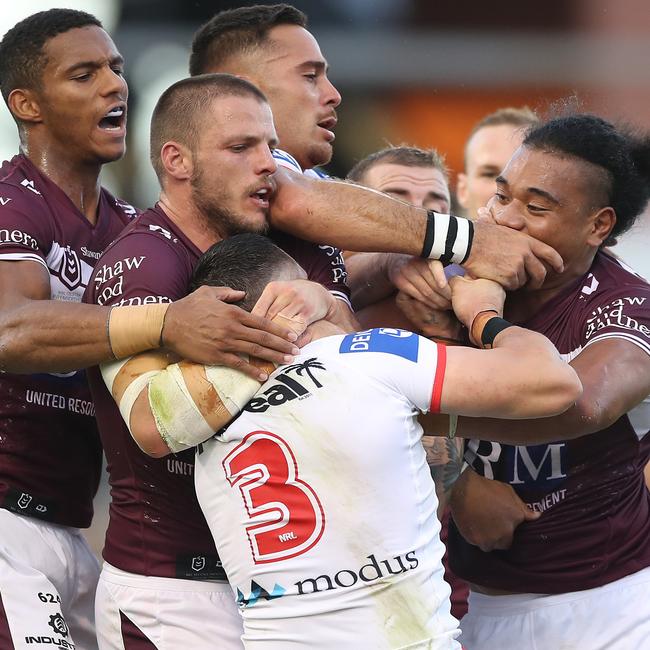 Moses Suli of the Sea Eagles and Jack Bird of the Dragons scuffle. Picture: Mark Kolbe/Getty Images