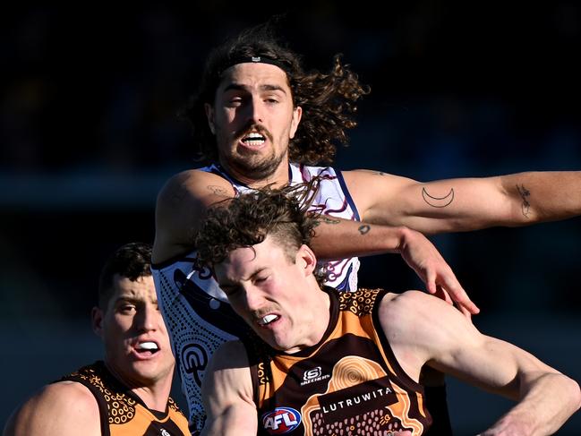 LAUNCESTON, AUSTRALIA – JULY 13: Luke Jackson of the Dockers and Denver Grainger-Barras of the Hawks compete for the ball during the round 18 AFL match between Hawthorn Hawks and Fremantle Dockers at University of Tasmania Stadium, on July 13, 2024, in Launceston, Australia. (Photo by Steve Bell/Getty Images)