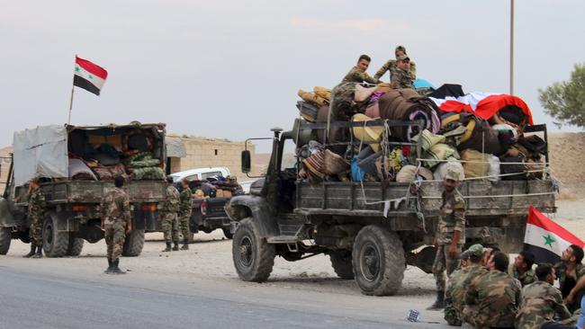 Syrian regime troops at the northern Syrian border town of Kobane. Picture: AFP.