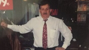 Eli Greenblat's father Sol in his Roger David store in Frankston, in Victoria, in the mid-1980s. Pic: Supplied