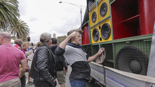 A Right-wing youth punches a set of speakers belonging to the Left. Picture: Wayne Taylor