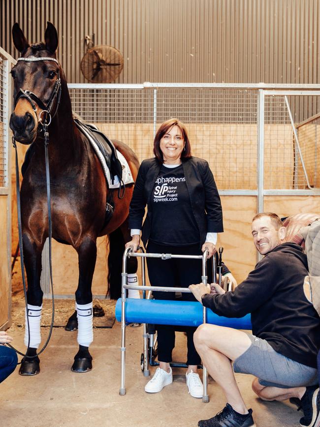 Special moment: Joy Heenan with her horse, Sandman, and personal trainer Vin Rabl. Pictures: Chloe Smith