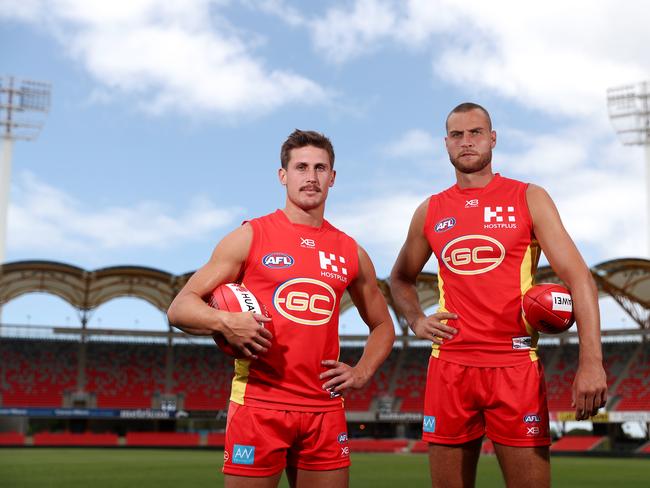 Captains David Swallow and Jarrod Witts pose during a Gold Coast Suns AFL media opportunity at Metricon Stadium on February 25, 2019 in Gold Coast, Australia. (Photo by Chris Hyde/Getty Images)