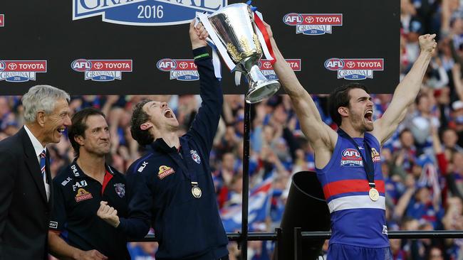 John Schultz, Luke Beveridge, Bob Murphy and Easton Wood celebrate the 2016 premiership. Picture: Wayne Ludbey