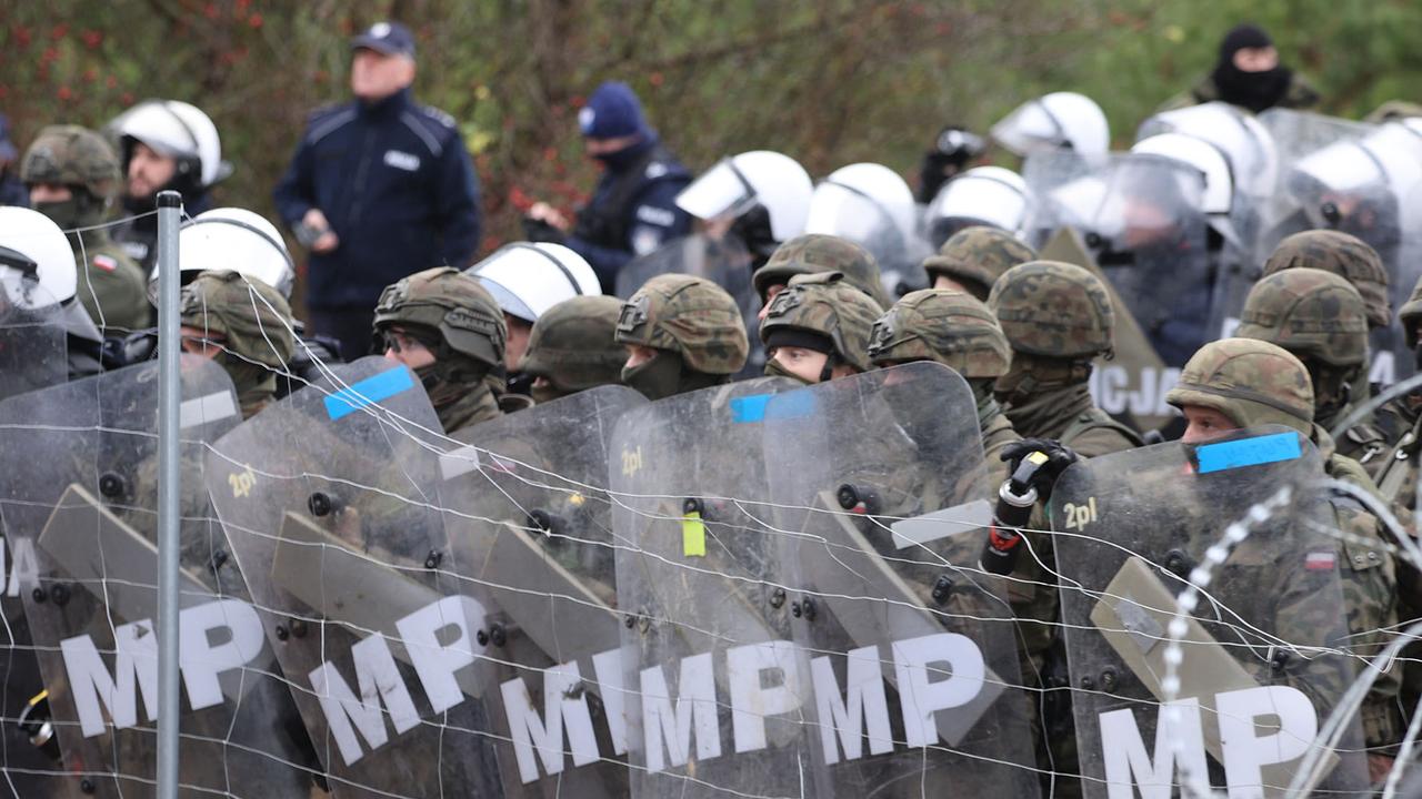 Poland announced this week that hundreds of migrants in Belarus were descending on its border, aiming to force their way into the country. Picture: Leonid Shcheglov/various sources/AFP