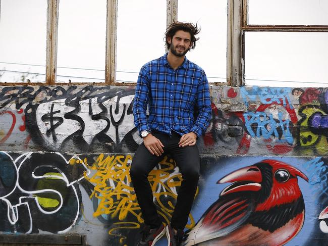 Brodie Grundy loves exploring Melbourne's street art. Picture: Wayne Ludbey