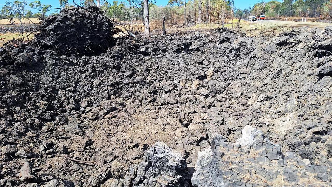 The crater left by Friday’s Bruce Highway explosion. Picture: TMR