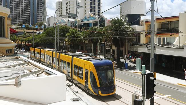The light rail's tram rolls through Surfers Paradise for the first time in 2014.