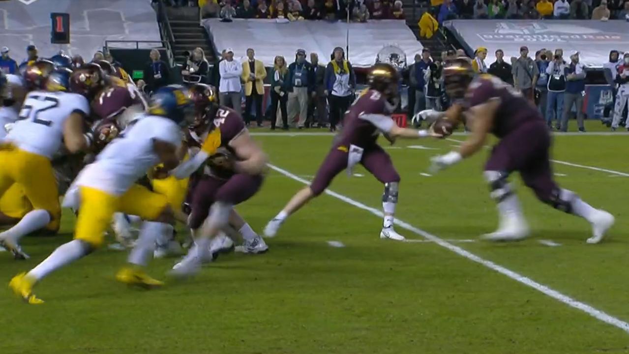 Melbourne-born offensive lineman Daniel Faalele gets the ball for a touchdown in the Guaranteed Rate Bowl.