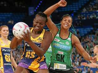 Peace Proscovia of the Lightning catches the ball against Stacey Francis of the Fever during the round two Super Netball match on Sunday. Picture: Paul Kane