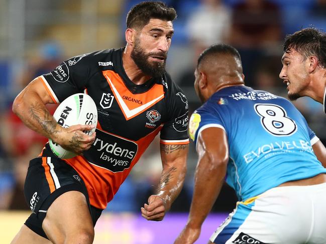 GOLD COAST, AUSTRALIA - MARCH 31: James Tamou of the Tigers runs the ball during the round four NRL match between the Gold Coast Titans and the Wests Tigers at Cbus Super Stadium, on March 31, 2022, in Gold Coast, Australia. (Photo by Chris Hyde/Getty Images)