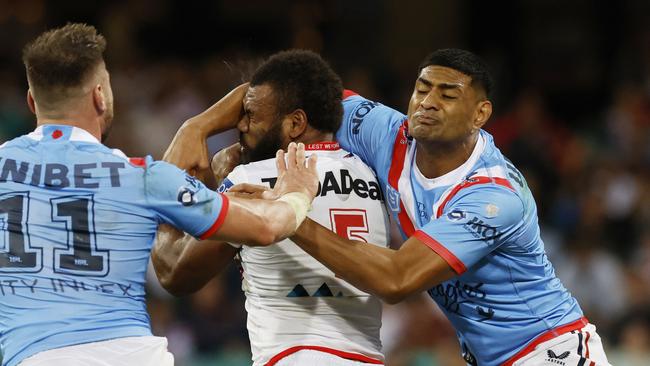 Daniel Tupou avoided the sin bin but was suspended for one game for this high shot. (AAP Image/Mark Evans)