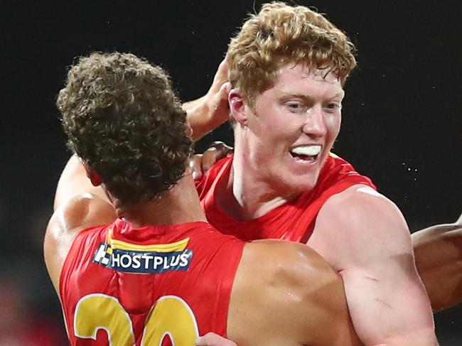 GOLD COAST, AUSTRALIA - JUNE 27: Matthew Rowell of the Suns celebrates a goal during the round 4 AFL match between the Gold Coast Suns and Fremantle Dockers at Metricon Stadium on June 27, 2020 in Gold Coast, Australia. (Photo by Chris Hyde/Getty Images)