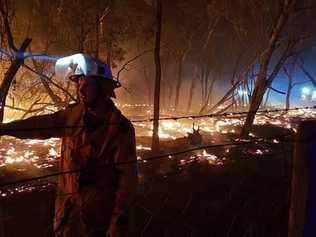 Firefighters battle a blaze in Karara.