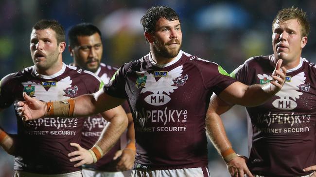 SYDNEY, AUSTRALIA - AUGUST 23: Blake Leary, Josh Starling and Jake Trbojevic of the Eagles look dejected during the round 24 NRL match between the Manly Warringah Sea Eagles and the Parramatta Eels at Brookvale Oval on August 23, 2015 in Sydney, Australia. (Photo by Mark Kolbe/Getty Images)