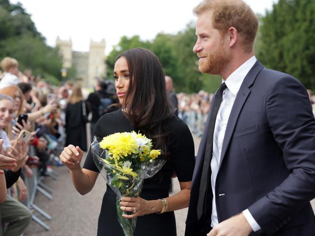 Meghan Duchess of Sussex and Prince Harry, Duke of Sussex speak with wellwishers at Windsor Castle. Picture: Chris Jackson – WPA Pool/Getty Images