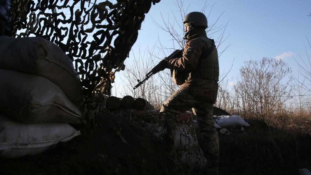 A Ukrainian serviceman keeps watch at a position on the frontline with Russia-backed separatists. Picture: Anatolii Stepanov/AFP