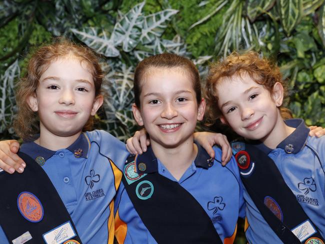 Young girl guides from across southeast Queensland attended the Dora and the Lost City of Gold Brisbane premiere on Saturday, August 31.Pictured: Abigail, Adele and Bethany from Ormeau. (AAP Image/Regi Varghese)