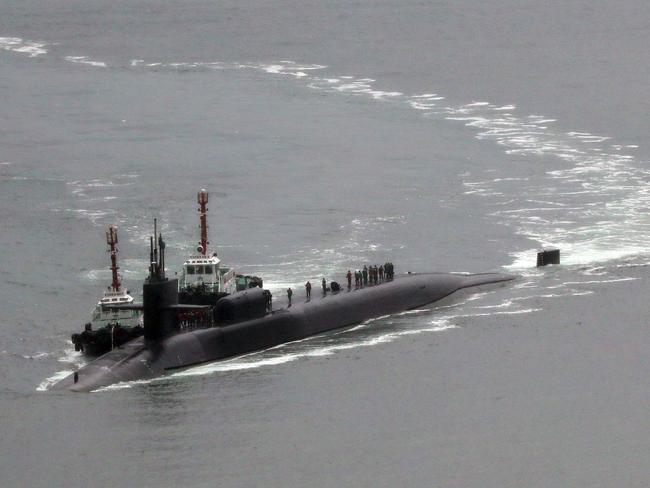 Nuclear-powered submarine USS Michigan approaches at the southeastern port city of Busan on April 25, 2017. North Korea on April 25, marked a military anniversary with a conventional firing drill, reports said, as South Korea announced joint naval exercises with a US aircraft carrier amid tensions over Pyongyang's nuclear ambitions. / AFP PHOTO / YONHAP / YONHAP /  - South Korea OUT / NO ARCHIVES -  RESTRICTED TO SUBSCRIPTION USE