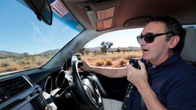 Steven Marshall on the radio to Aboriginal elders during his annual 1200km drive through the APY Lands