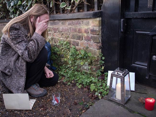 A George Michael fan reacts outside Michael's London home. Picture: AP