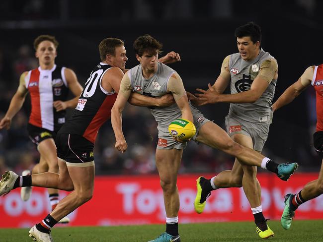 Paddy Dow of the Blues (third from left) and David Armitage of the Saints