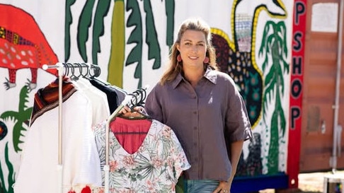 A new op-shop is set to open in the remote Northern Territory town of Timber Creek. Founder of Remote OpShops Project Tanya Egerton with clothes and supplies. Picture: Stephanie Coombes / Supplied.