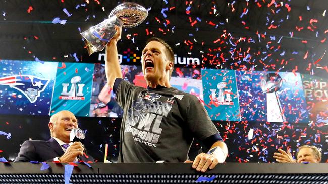 Tom Brady celebrates with the Vince Lombardi Trophy after beating Atlanta Falcons.